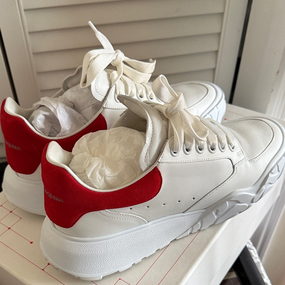 White Sneakers with Red Heel Accent